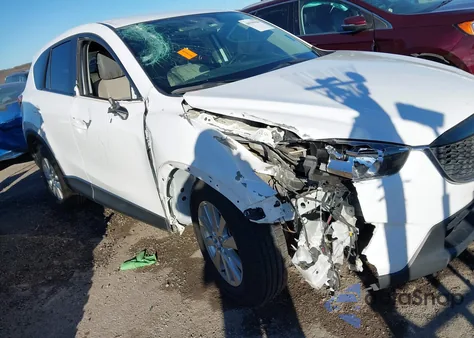 2015 Mazda Cx-5 Touring z USA, uszkodzony, nr VIN JM3KE2CY2F0470800